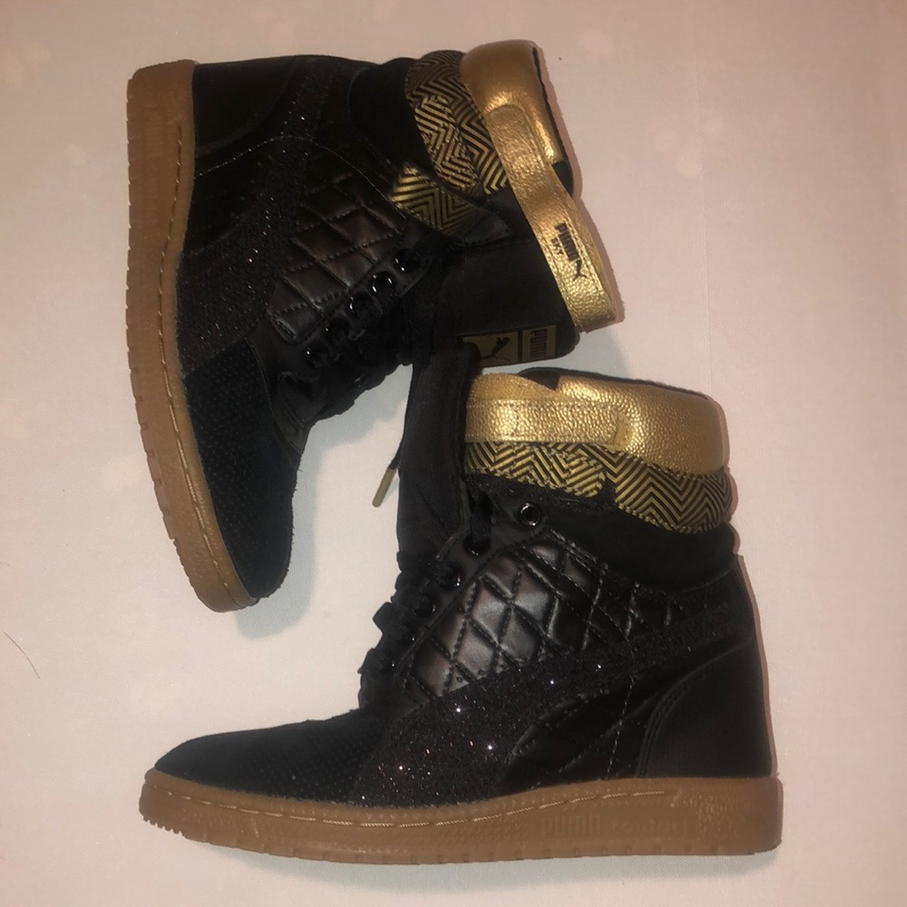 Woman’s Puma wedge Sneaker’s